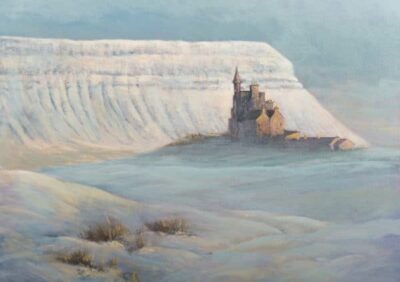 Snow-covered landscape featuring Ben Bulben mountain with a distant castle and soft, muted colors in the sky