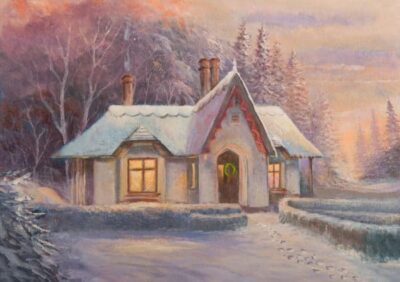 Charming winter scene of Deenagh Lodge, Co. Kerry, with snow-covered roof and festive wreath on the door