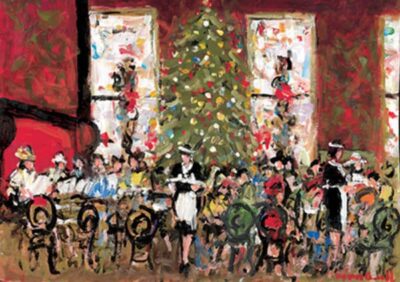 A festive gathering with a decorated Christmas tree, people seated at a table, and vibrant red walls in a cozy setting